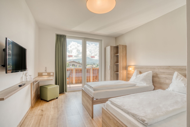 Hotel COOEE alpin Hotel Kitzbüheler Alpen  se snídaní